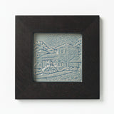Decorative ceramic tile in blue glaze of Cincinnati Coney Island in Ebony Frame
