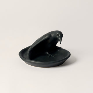 Black ceramic dish, ashtray, shaped like a Rook bird.