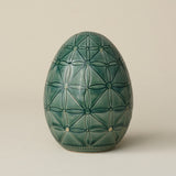 Handcrafted ceramic egg by Rookwood Pottery