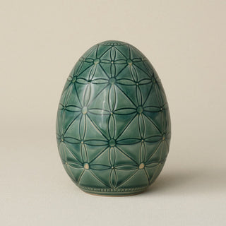 Handcrafted ceramic egg by Rookwood Pottery