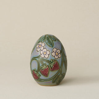 Handcrafted ceramic egg by Rookwood Pottery