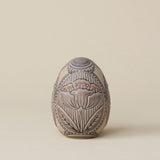 Handcrafted ceramic egg by Rookwood Pottery