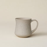 Hand-thrown ceramic mug by Rookwood Pottery