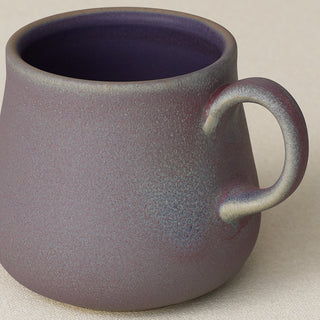 Close-up details of hand-thrown mug by Rookwood