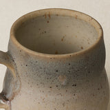 Close-up details of hand-thrown mug by Rookwood