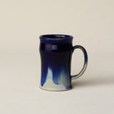 Hand-thrown ceramic mug by Rookwood Pottery
