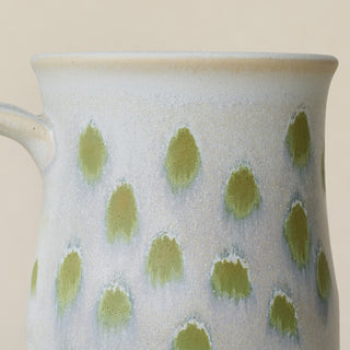 Close-up details of hand-thrown mug by Rookwood