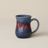 Hand-thrown ceramic mug by Rookwood Pottery