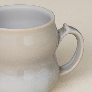 Close-up details of hand-thrown mug by Rookwood