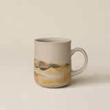 Hand-thrown ceramic mug by Rookwood Pottery