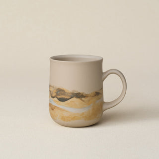 Hand-thrown ceramic mug by Rookwood Pottery
