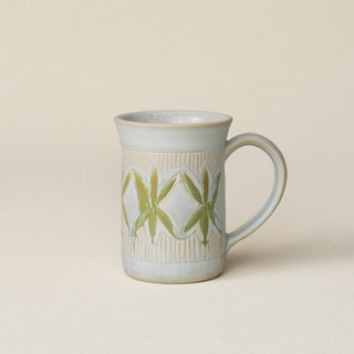 Hand-thrown ceramic mug by Rookwood Pottery