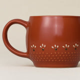 Close-up details of hand-thrown mug by Rookwood