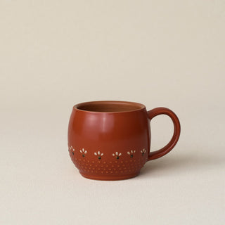 Hand-thrown ceramic mug by Rookwood Pottery