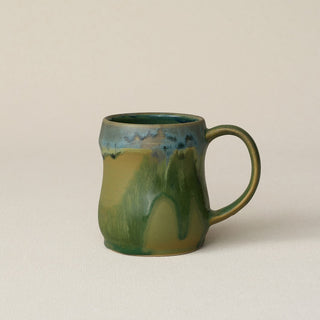 Hand-thrown ceramic mug by Rookwood Pottery