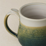 Close-up details of hand-thrown mug by Rookwood