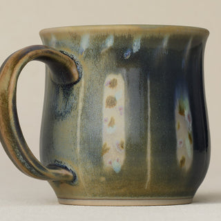 Close-up details of hand-thrown mug by Rookwood