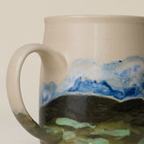 Close-up details of hand-thrown mug by Rookwood