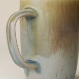 Close-up details of hand-thrown mug by Rookwood