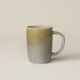 Hand-thrown ceramic mug by Rookwood Pottery