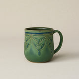 Hand-thrown ceramic mug by Rookwood Pottery