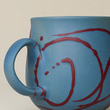 Close-up details of hand-thrown mug by Rookwood