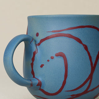Close-up details of hand-thrown mug by Rookwood