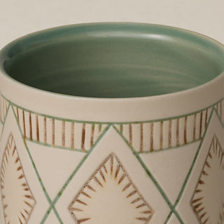 Close-up details of hand-thrown mug by Rookwood