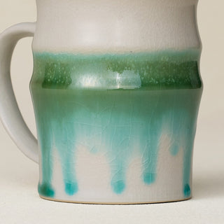 Close-up details of hand-thrown mug by Rookwood