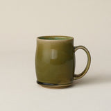 Hand-thrown ceramic mug by Rookwood Pottery