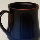 Close-up details of hand-thrown mug by Rookwood