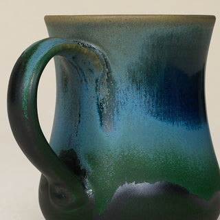 Close-up details of hand-thrown mug by Rookwood