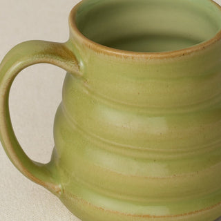 Close-up details of hand-thrown mug by Rookwood