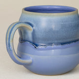 Close-up details of hand-thrown mug by Rookwood