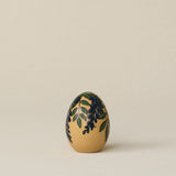Handcrafted ceramic egg by Rookwood Pottery