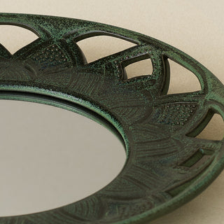 Close-up details of the one-of-a-kind mirror.