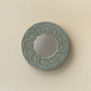 Hand-thrown and hand-glazed ceramic wall mirror by Rookwood Pottery