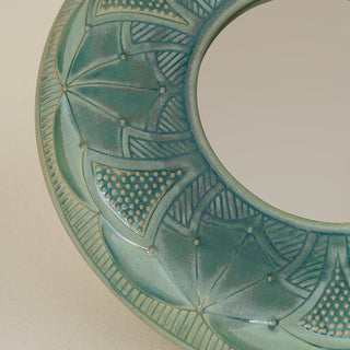 Close-up details of the one-of-a-kind mirror.