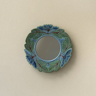 Hand-thrown and hand-glazed ceramic wall mirror by Rookwood Pottery
