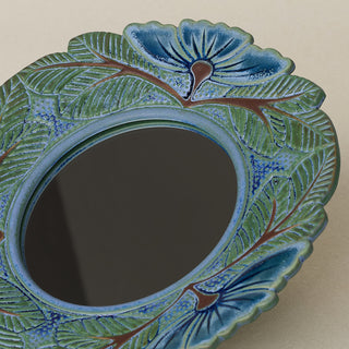 Close-up details of the one-of-a-kind mirror.