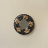 Hand-thrown and hand-glazed ceramic wall mirror by Rookwood Pottery