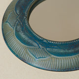 Close-up details of the one-of-a-kind mirror.