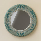 Hand-thrown and hand-glazed ceramic wall mirror by Rookwood Pottery