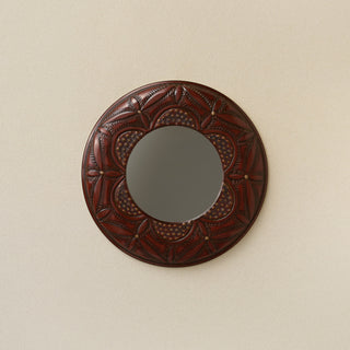 Hand-thrown and hand-glazed ceramic wall mirror by Rookwood Pottery