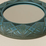 Close-up details of the one-of-a-kind mirror.