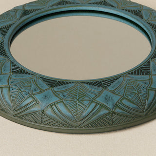 Close-up details of the one-of-a-kind mirror.