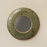 Hand-thrown and hand-glazed ceramic wall mirror by Rookwood Pottery