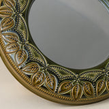 Close-up details of the one-of-a-kind mirror.