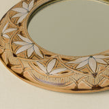 Close-up details of the one-of-a-kind mirror.
