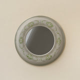 Hand-thrown and hand-glazed ceramic wall mirror by Rookwood Pottery